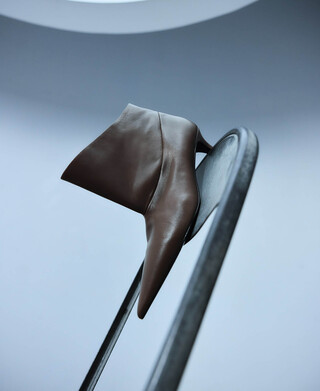 Bot&iacute;n ca&ntilde;a asim&eacute;trica piel