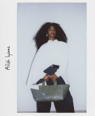 Mica elongated hand bag woman