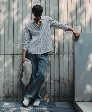 Pantalon en jean effiloch&eacute; &agrave; coupe en tonneau
