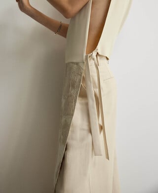 Asymmetrical combined vest woman Asymmetrical combined vest woman