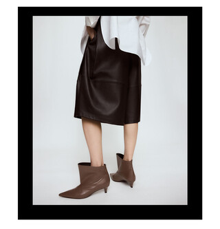 Bottines asym&eacute;triques en cuir pour femme