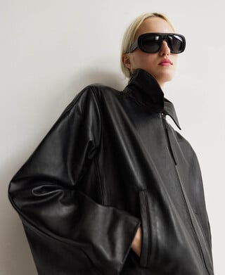 Leather jacket with back cape woman Leather jacket with back cape woman