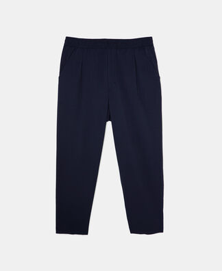 Carrot silhouette pleated trousers