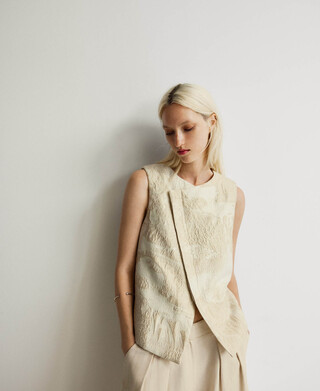 Asymmetrical combined vest woman Asymmetrical combined vest woman