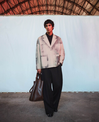 Aged-effect barrel fit trousers man