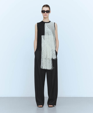 Top com franjas em malha intarsia