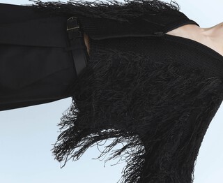 Casaco curto com franjas