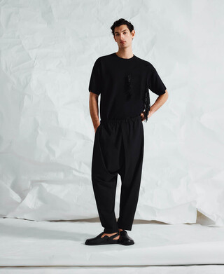 Pantal&oacute;n pierna drapeada