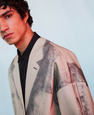 Aged-effect barrel fit trousers man