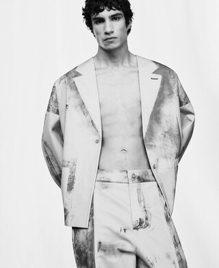 Aged-effect barrel fit trousers man