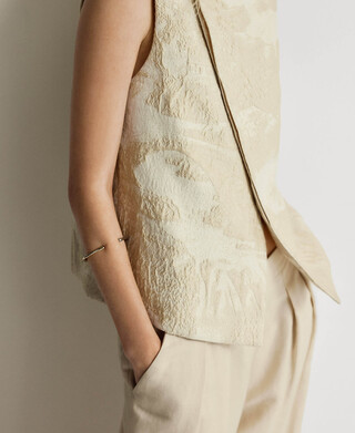 Asymmetrical combined vest woman Asymmetrical combined vest woman