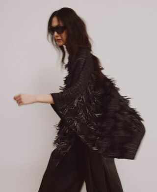 Asymmetrische Strick-Jacquard-Fransen