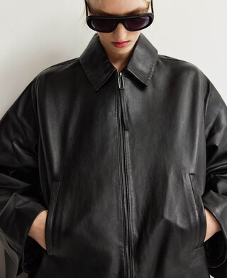 Leather jacket with back cape woman Leather jacket with back cape woman