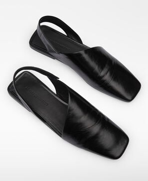 Leather asymmetric mules