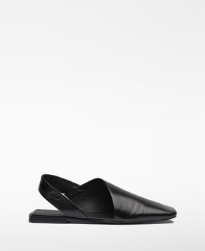 Leather asymmetric mules