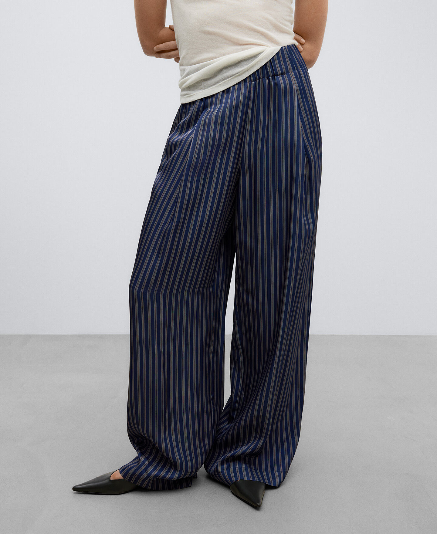 Ladies navy and new arrivals white striped trousers