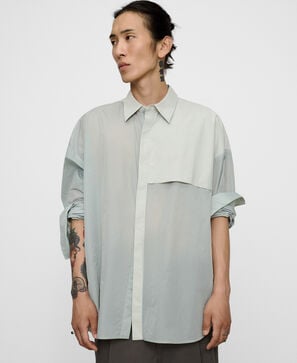 Camisa semitransparente detalle canes&uacute;