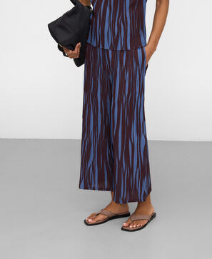 Two-tone irregular pleated trousers