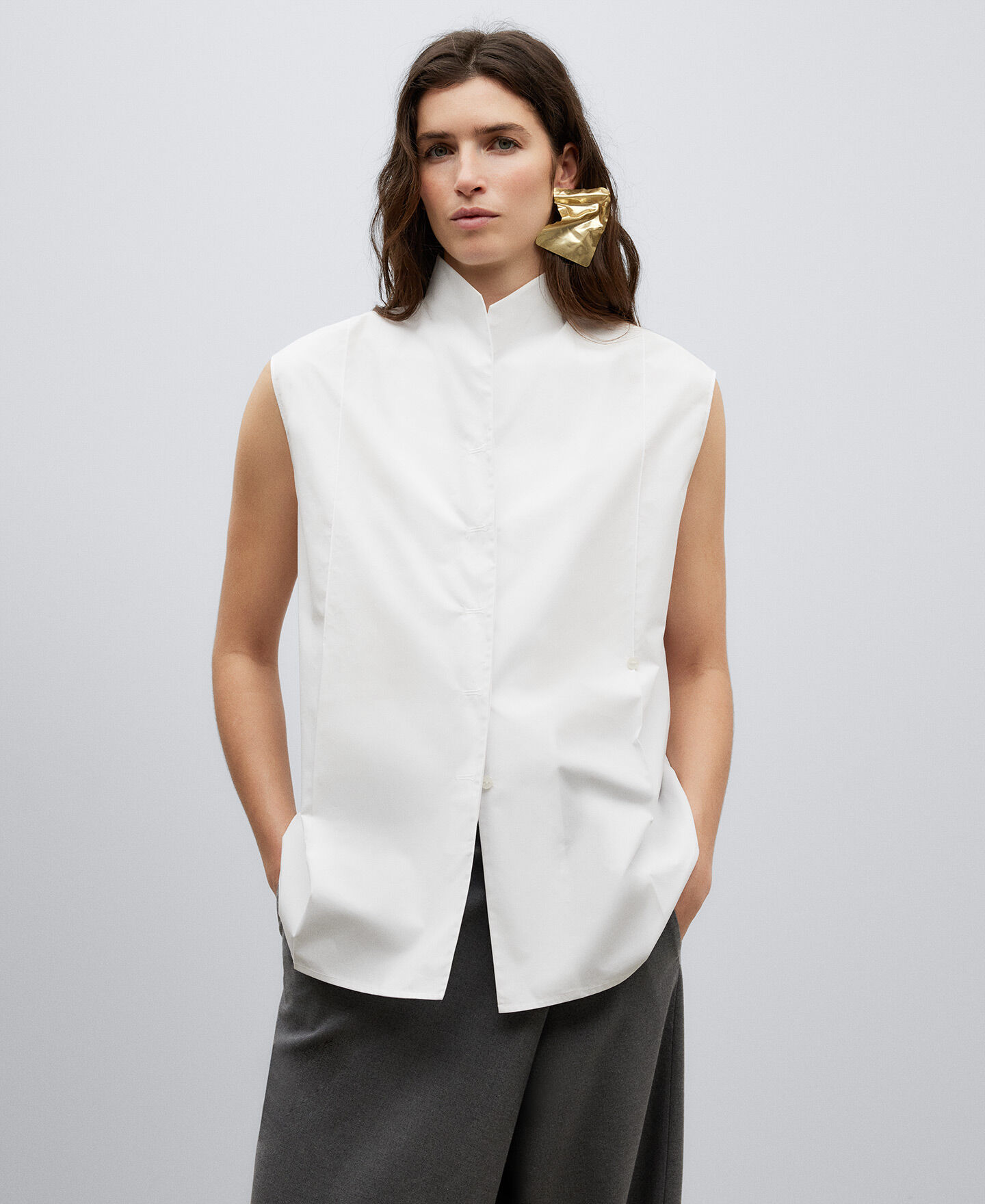 Blusa blanca store sin manga