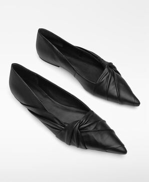 Leather draped ballerina woman