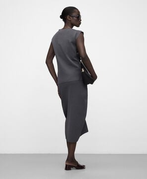Asymmetric knit top with side ruffle