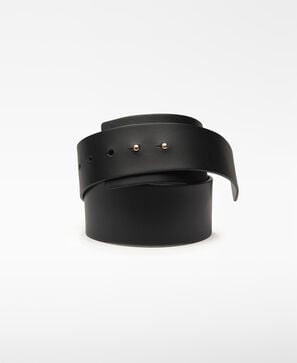 Black belt with cufflinks woman