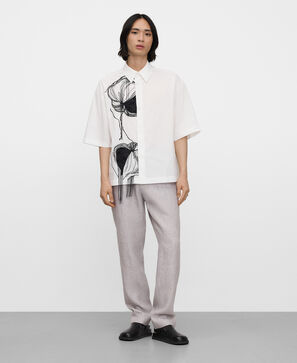 Camisa relaxed fit bordada con flecos