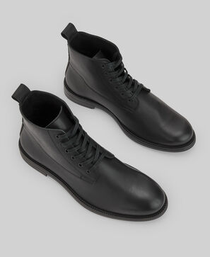 Bota cordones piel responsable hombre