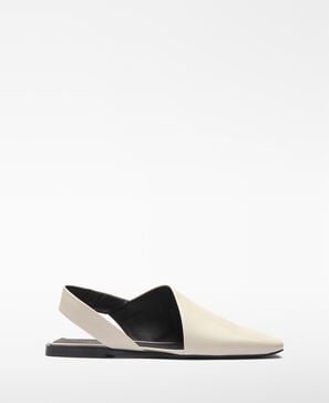 Leather asymmetric mules
