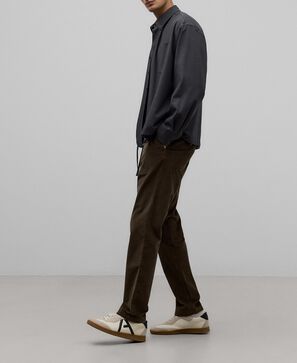 Brown corduroy trousers man