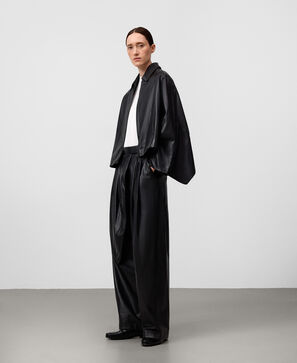 Leather jacket with back cape woman