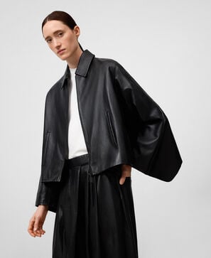 Leather jacket with back cape woman