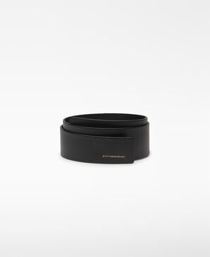 Black belt with cufflinks woman