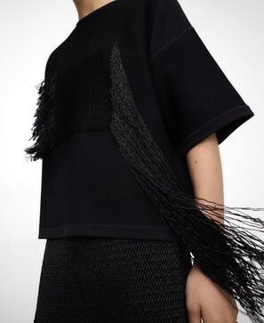 Intarsia knit sweater with fringe