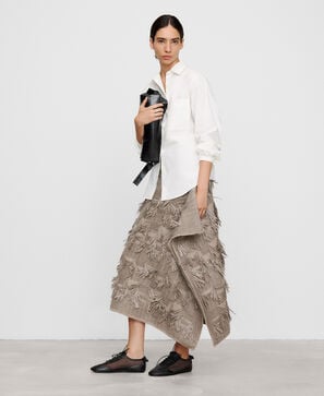 Jacquard asymmetric skirt with fringes