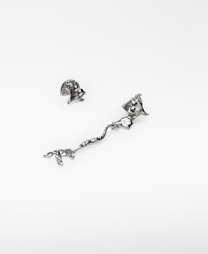 Asymmetrical metal earrings woman
