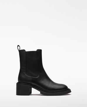 Leather heeled ankle-boot woman