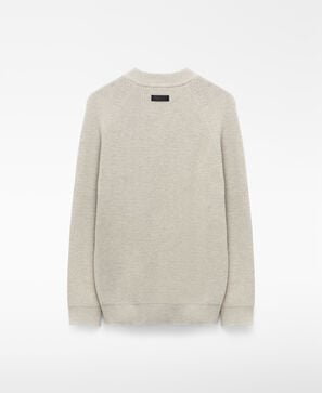 Knit cross-over V-neck sweater