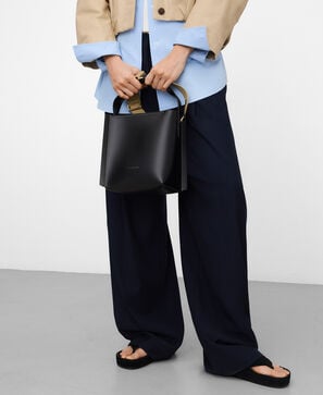 Mica leather asymmetric bucket bag
