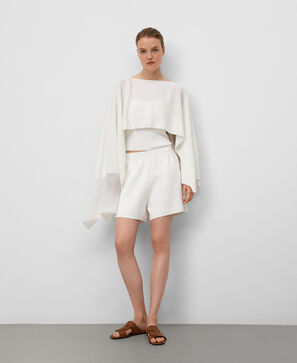 Cape asymétrique en maille femme