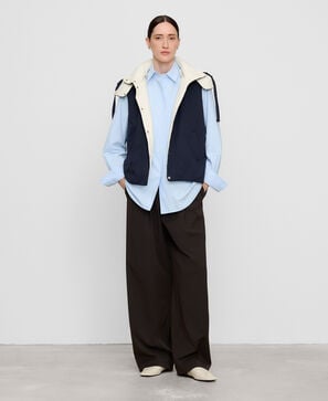 Reversible padded vest with hood