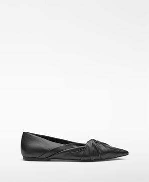 Leather draped ballerina woman