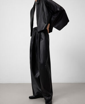 Leather pleated trousers woman