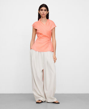 Extended shawl collar wrap top