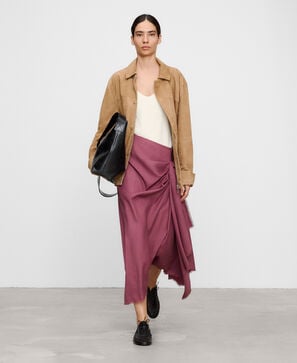Long skirt with side draping