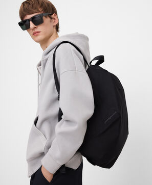 Asymmetric backpack with fold detail