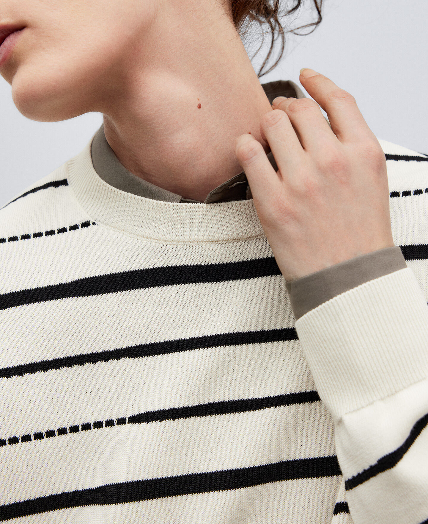 Asymmetrical striped sweater woman
