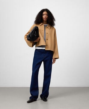 Short jacket with back cape woman