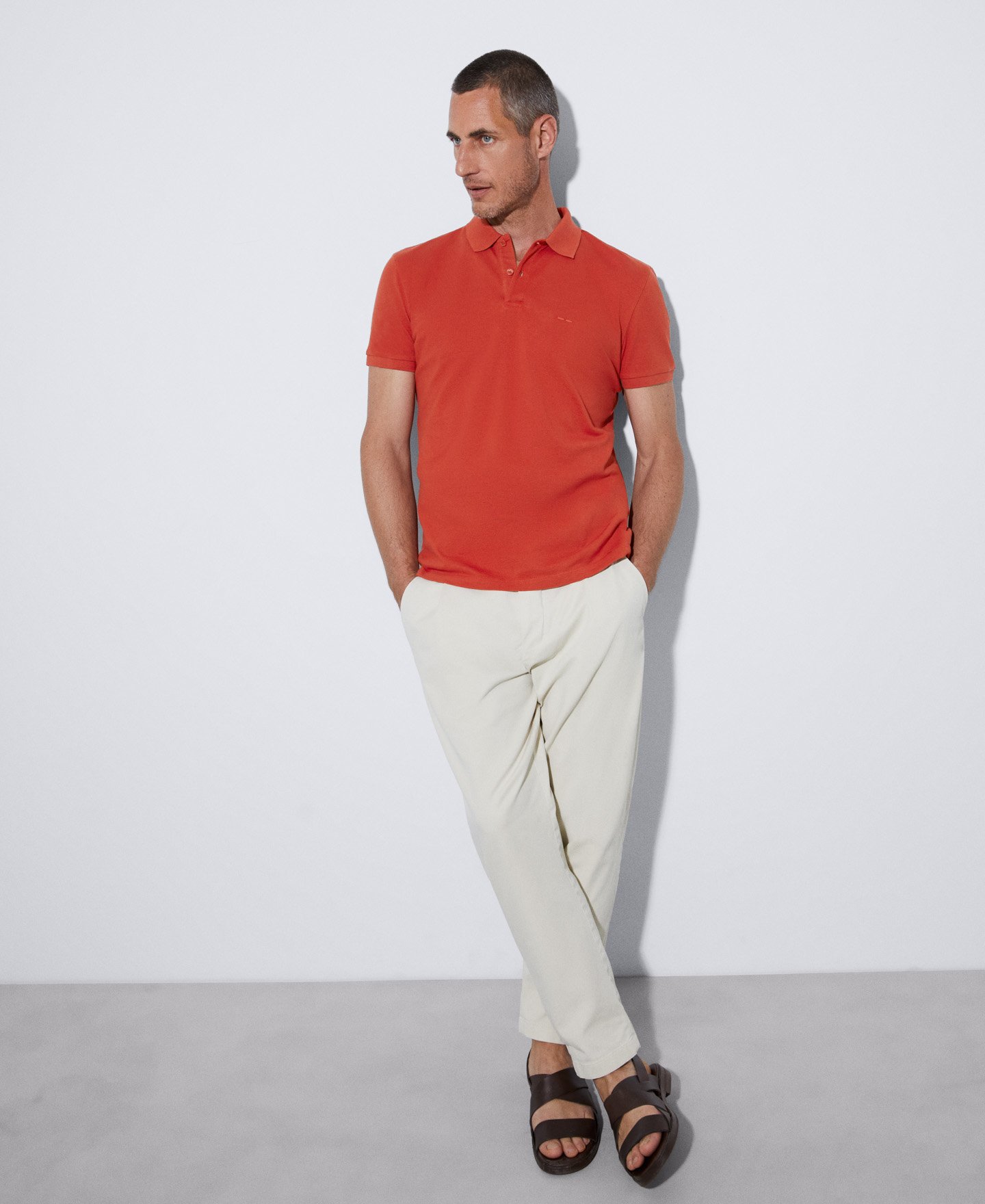 Cotton pique two button polo shirt image number 1
