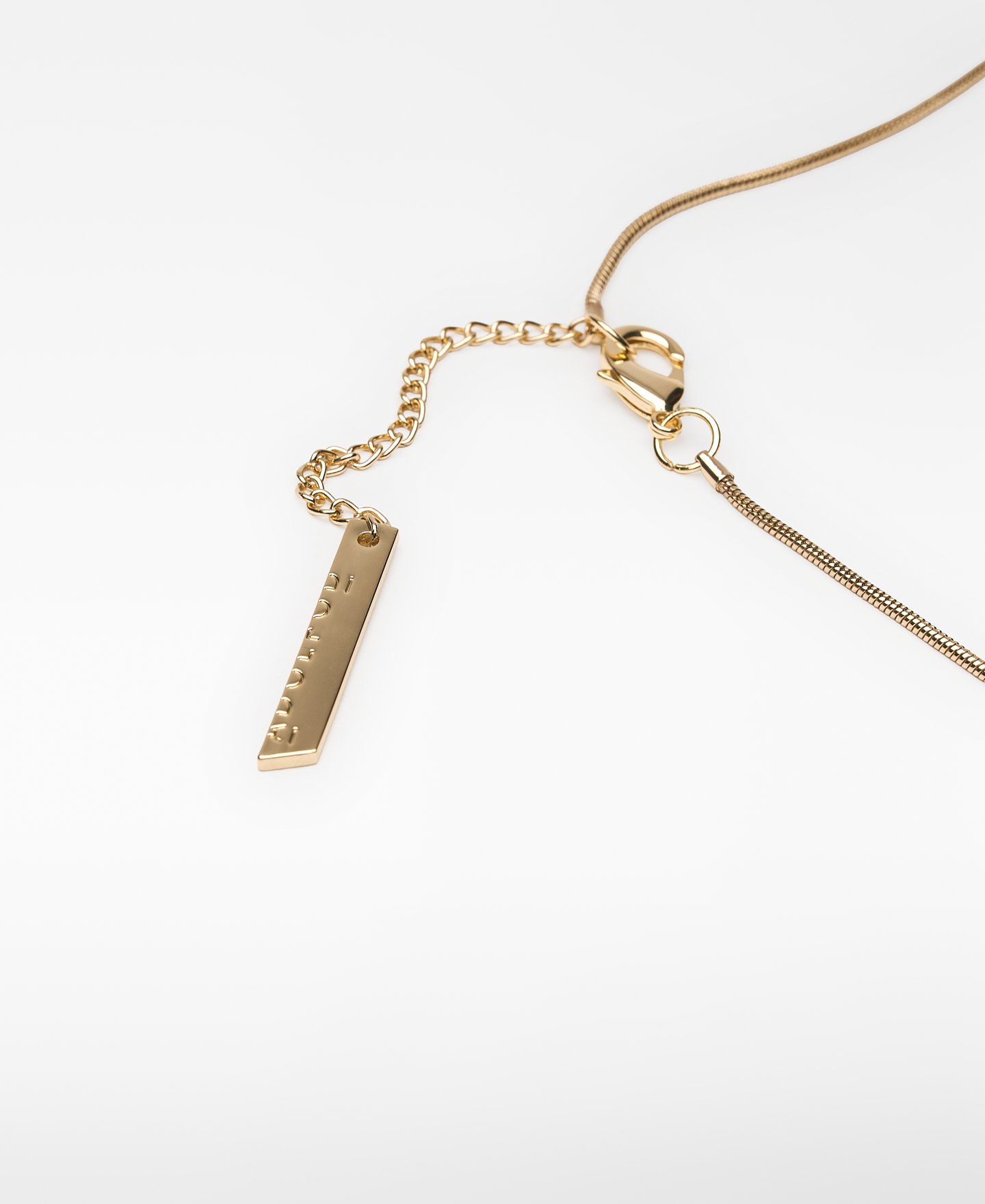 Metal necklace with two-tone resin piece image number 2